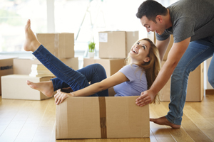 Couple and moving box